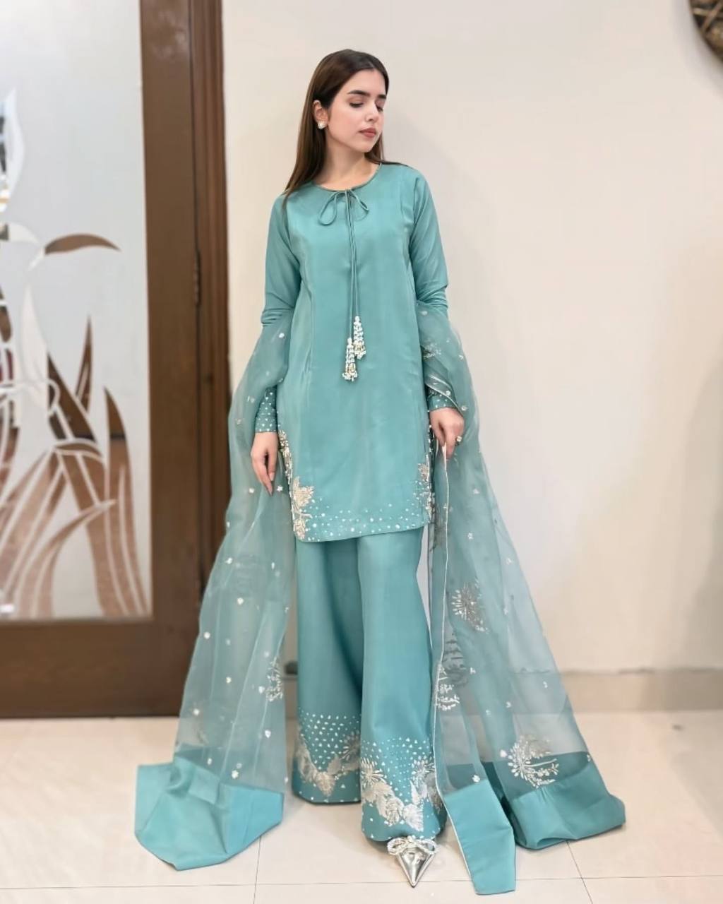 Teal Elegance: Embellished Suit with Sheer Dupatta and Graceful Traditional Charm