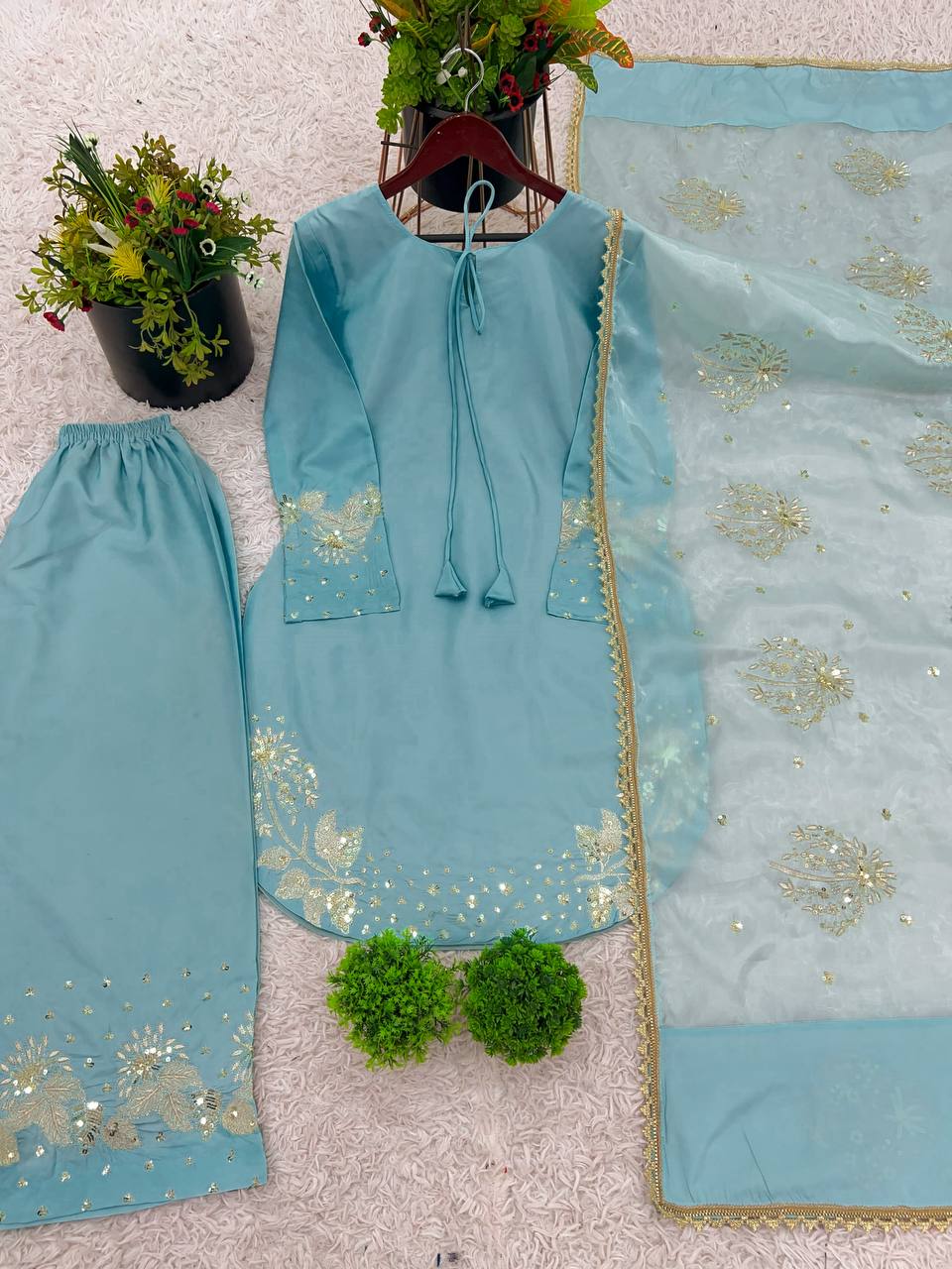 Teal Elegance: Embellished Suit with Sheer Dupatta and Graceful Traditional Charm
