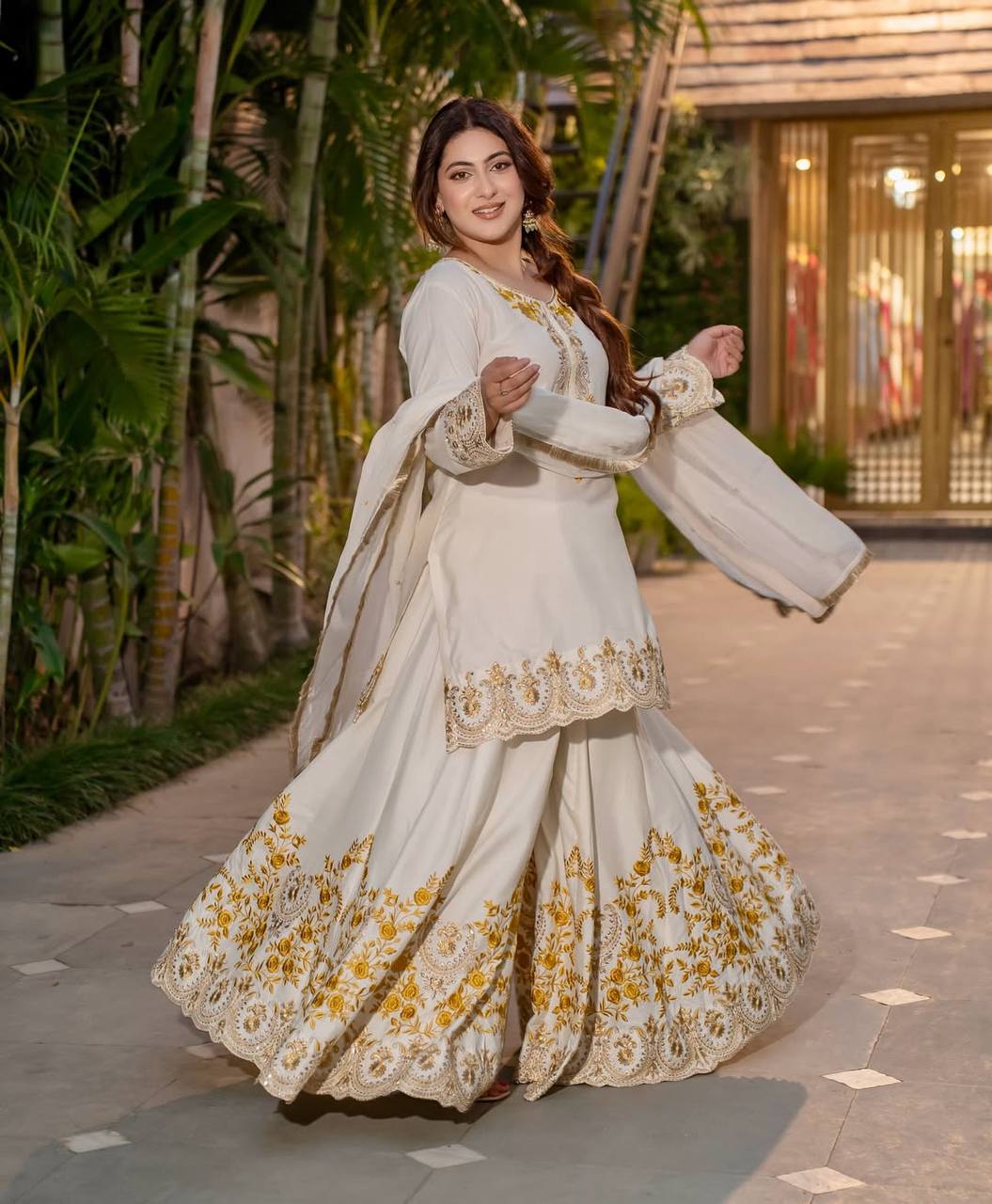 Pure Heavy Natural Crepe Silk with Heavy Embroidery & Fancy Latkan Dori Sleeves