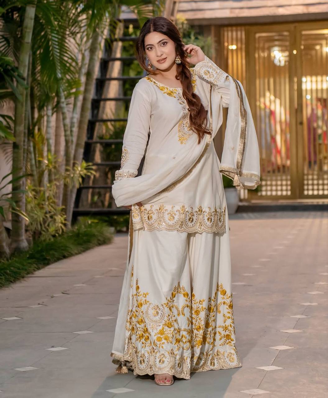 Pure Heavy Natural Crepe Silk with Heavy Embroidery & Fancy Latkan Dori Sleeves