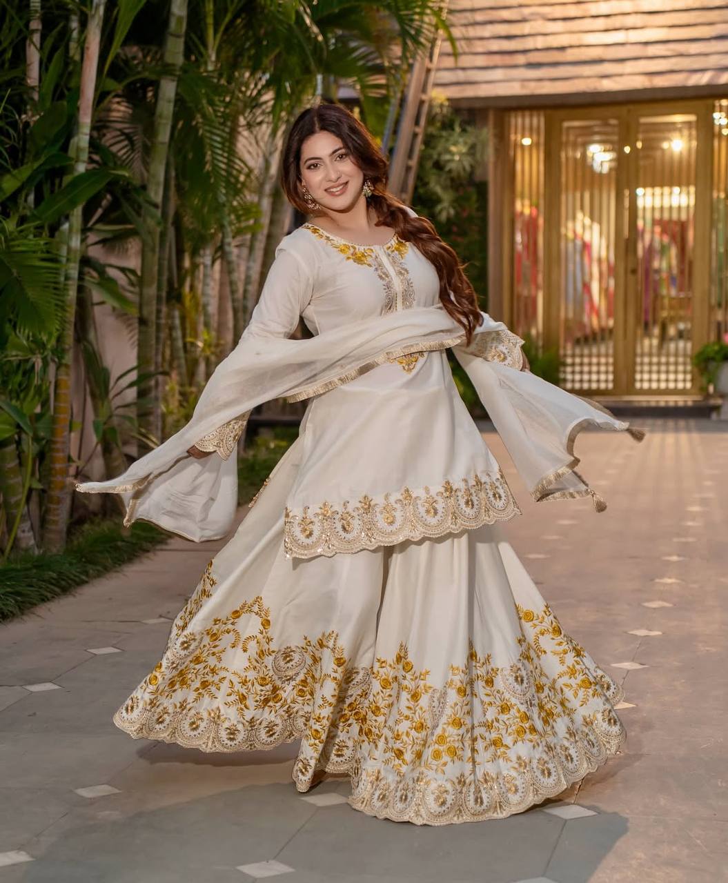 Pure Heavy Natural Crepe Silk with Heavy Embroidery & Fancy Latkan Dori Sleeves