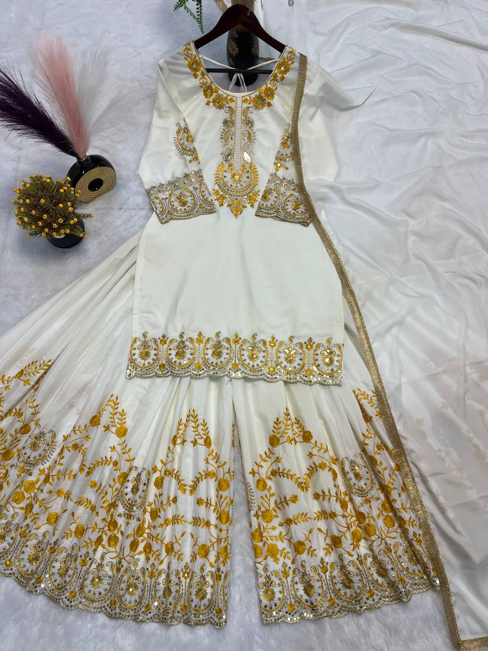 Pure Heavy Natural Crepe Silk with Heavy Embroidery & Fancy Latkan Dori Sleeves