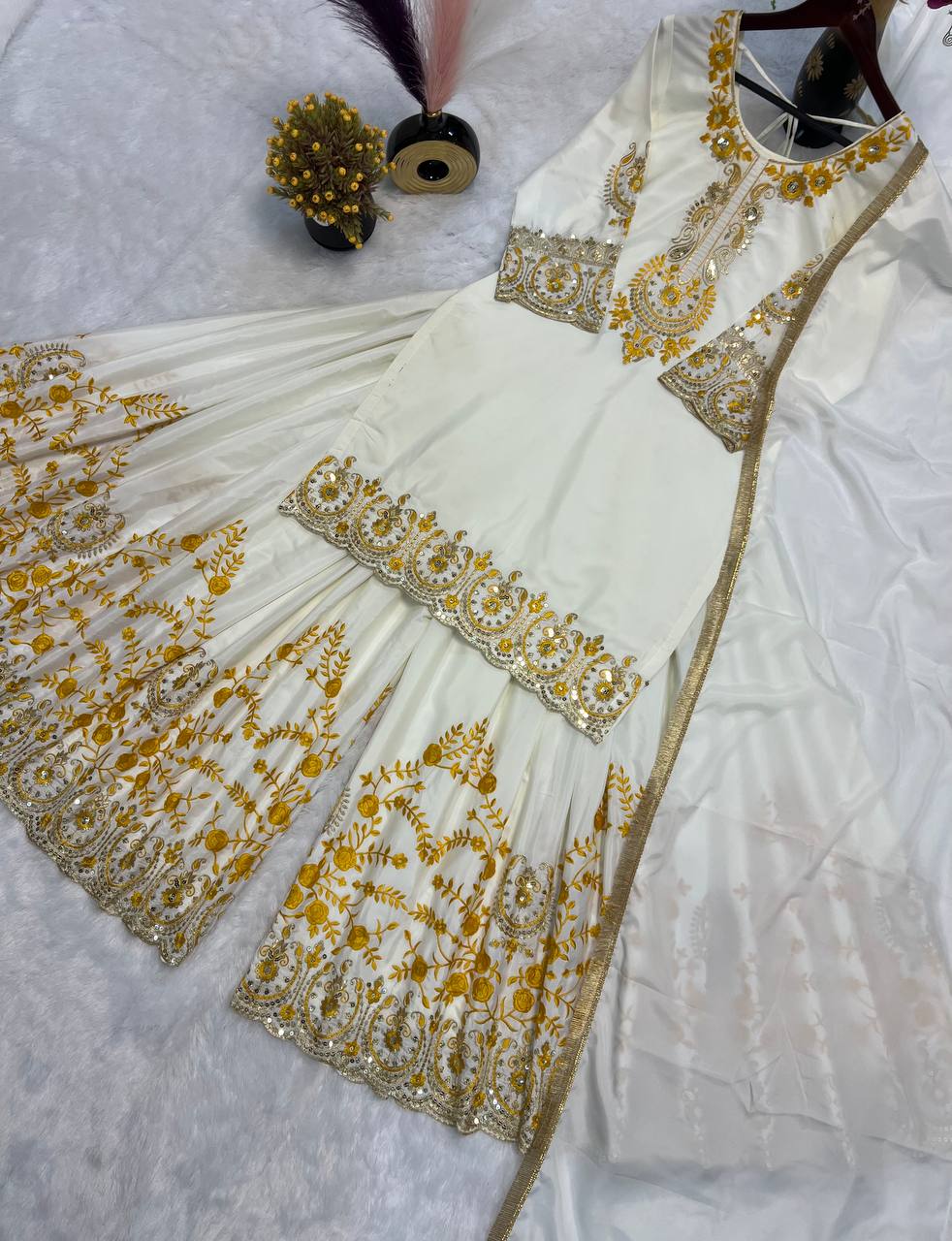 Pure Heavy Natural Crepe Silk with Heavy Embroidery & Fancy Latkan Dori Sleeves