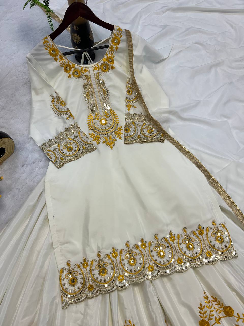 Pure Heavy Natural Crepe Silk with Heavy Embroidery & Fancy Latkan Dori Sleeves