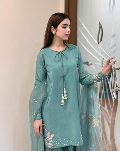 Teal Elegance: Embellished Suit with Sheer Dupatta and Graceful Traditional Charm