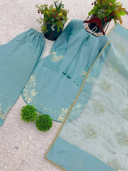 Teal Elegance: Embellished Suit with Sheer Dupatta and Graceful Traditional Charm