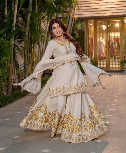 Pure Heavy Natural Crepe Silk with Heavy Embroidery & Fancy Latkan Dori Sleeves