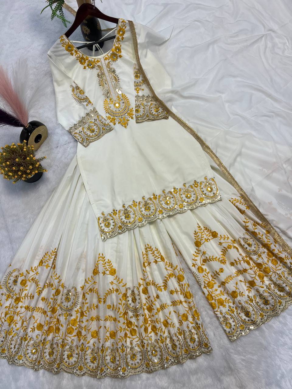 Pure Heavy Natural Crepe Silk with Heavy Embroidery & Fancy Latkan Dori Sleeves